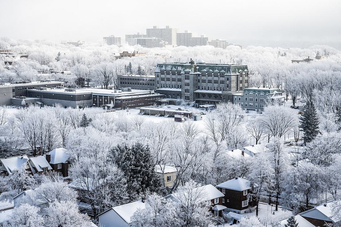 The Quebec City skyline in snow and fog
